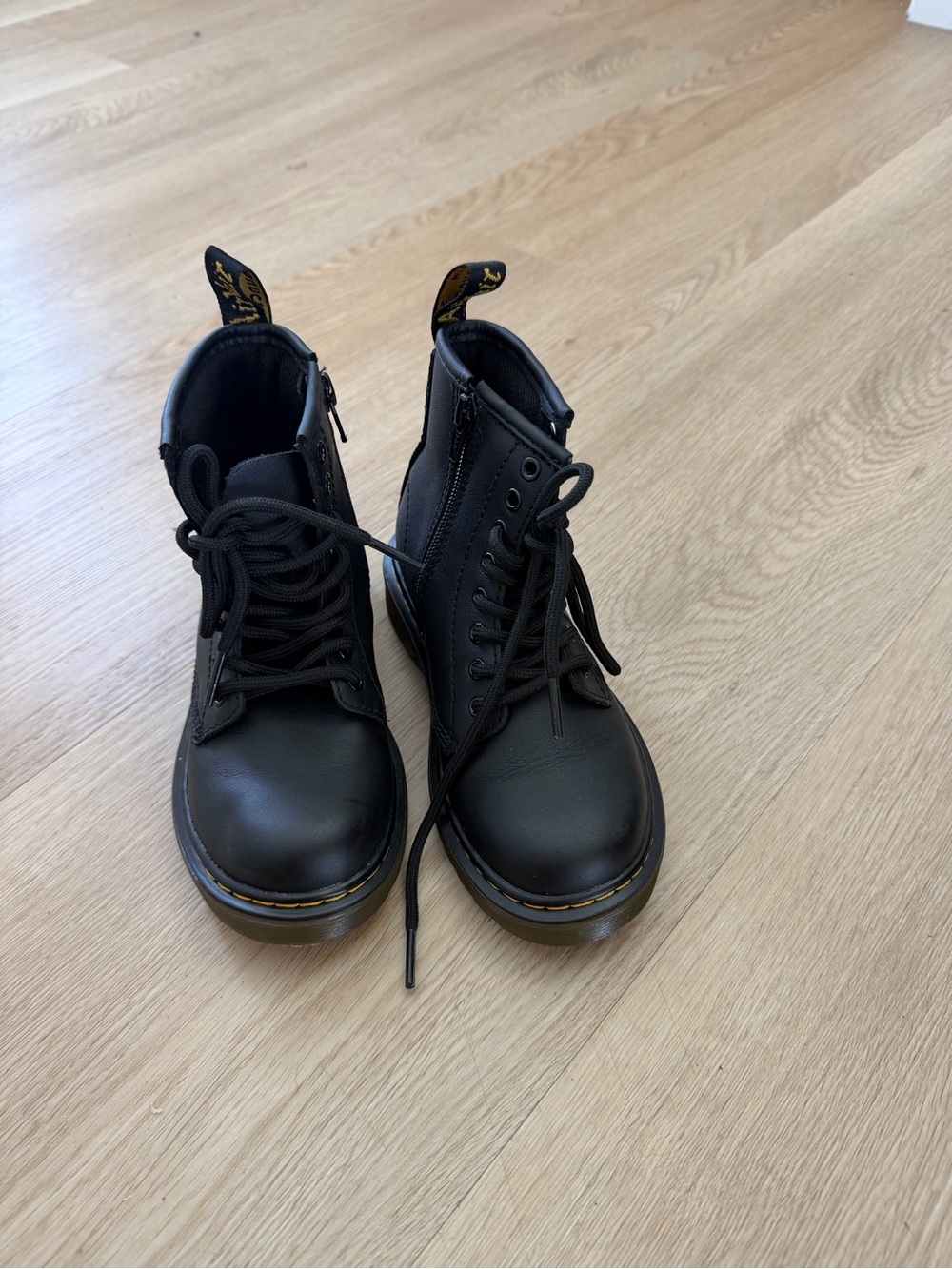 Dr. Martens Kids Black Leather Ankle Boots with Yellow Stitching